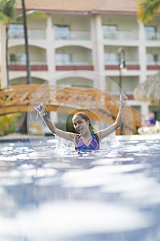 Happy Girl in the Swimming Pool