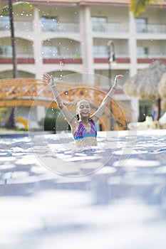 Happy Girl in the Swimming Pool