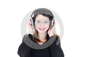 Happy girl teenager with headphones listen to music