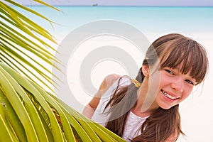 Happy girl on tropical beach