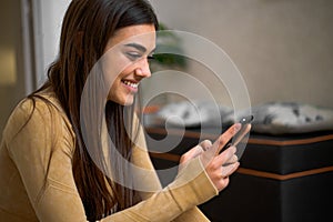 Happy girl using smartphone app enjoying online virtual chat video call with friends virtual meeting recording stories for social