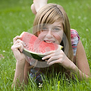 Happy girl with watermelon