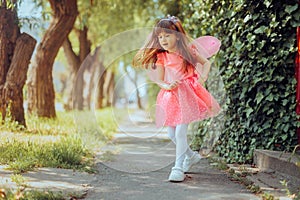 Happy Girl Wearing Butterfly Wings Playing Outdoors