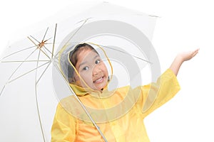 Happy girl is wearing yellow raincoat