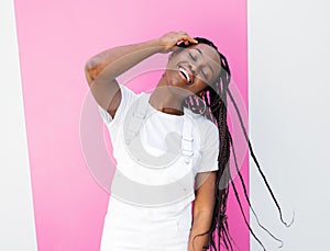 Happy girl in white casual clothes having fun