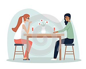 Happy girlfriends talking at table with flowers and glasses of alcohol vector