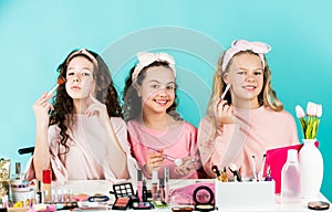 Happy girls doing makeup together. Sisterhood happiness. Cosmetics shop. Control oil. Apply lipstick. Prevent acne. Kids