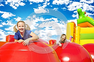 Happy Girls on Inflate Castle