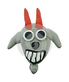 Happy goat closeup face on white made from plasticine