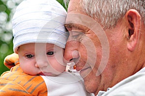 Happy grandfather with grandchild