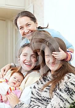 Happy grandmother with daughters and granddaughters