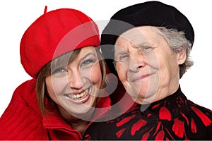 Happy grandmother and granddaughter with berets