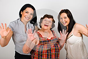 Happy grandmother with granddaughters