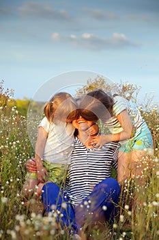 Happy grandmother with two granddaughters