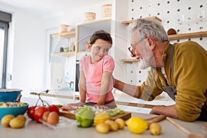 Happy grandparent playing, having fun with grandchildren