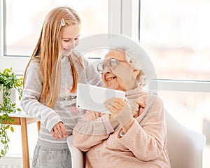 Happy granny with granddaughter