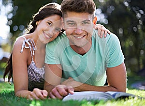 Happy, grass and portrait of couple with books for reading, learning and studying together outdoors. University, college