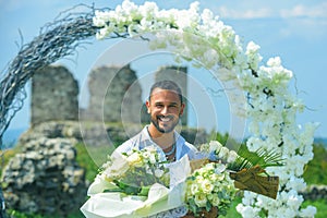 Happy Groom smiling. Attractive male model on party, comes to congratulate, celebrates festive event. Man with holiday