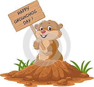 Happy groundhog day. Funny groundhog holding wooden sign