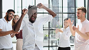 Happy group of business team celebrating a good job in the office