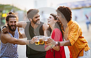 Happy group of friends having fun, travelling and smiling