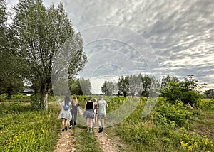 Happy group of friends on a hiking trip in Mazowsze in Poland