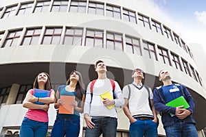 Happy group of students standing together