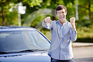 Happy guy with car keys