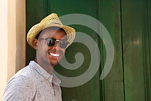 Happy guy with hat and sunglasses