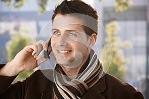 Happy guy on mobile call