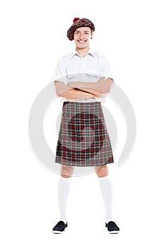 Happy guy in national scotch clothes