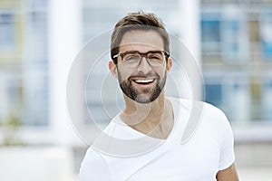 Happy guy in spectacles