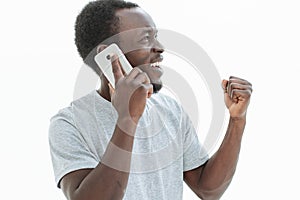 Happy guy talking on his cell phone. isolated on white