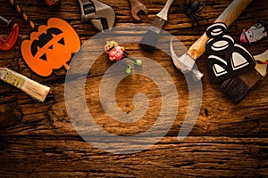 Happy Halloween day with construction DIY handy tools on grunge wood background concept. Flat lay Top view with copy space for