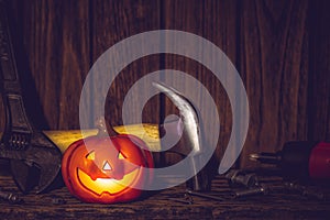 Happy Halloween day with construction tools and home DIY handy tools on rusty wooden background concept with copy space