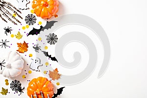 Happy Halloween holiday concept. Halloween decorations, pumpkins, bats, ghosts, spiders, webs, skeleton hands on white background