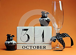 Happy Halloween save the date white block calendar with champagne glass and chocolate muffins