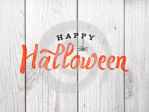 Happy Halloween Text Over Distressed Wood Background