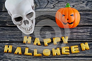 Happy Halloween words decoration on wooden background