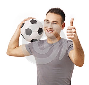 Happy handsome holding soccer ball