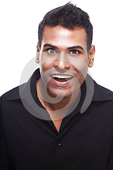 Happy, handsome Indian Man laughing
