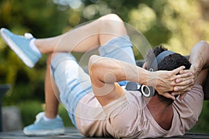 happy handsome man on bench outdoors