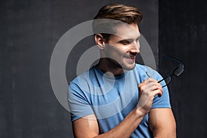 Happy handsome man wear blue t-shirt