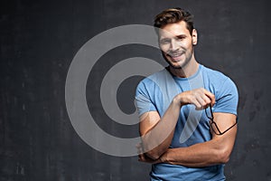 Happy handsome man wear blue t-shirt