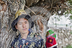 Happy and hansome young man in tradtional dress