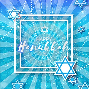 Happy Hanukkah with origami blue Magen David stars.