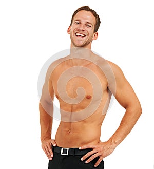 Happy,healthy and confident. Studio portrait of a handsome young man posing shirtless against a white background.