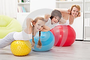 Happy healthy family exercising