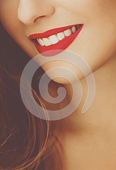 Happy healthy female smile with perfect natural white teeth, beauty face closeup of smiling young woman, bright lipstick