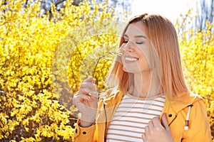 Happy healthy woman enjoying springtime outdoors. Allergy free concept